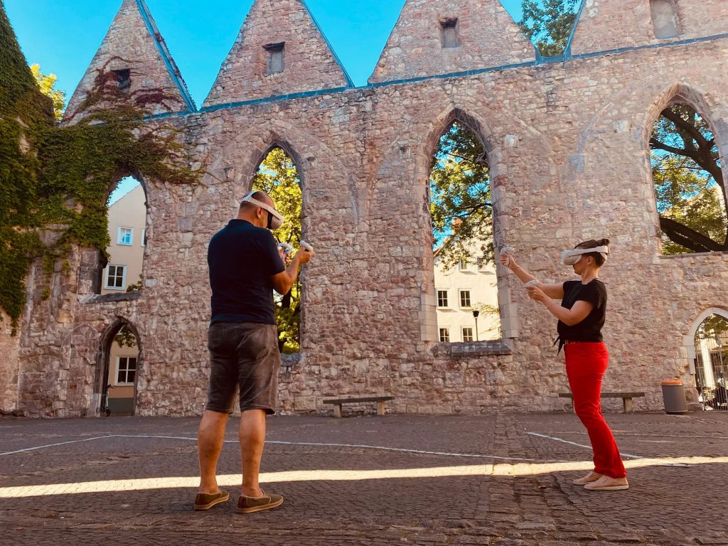 Participants of AR Journey Futuring crafting sculptures in VR at Aegidien Church.